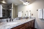 Master bathroom has granite countertops with his and hers sinks 